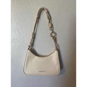 Charles & Keith Cream Baguette Shoulder Bag with Lock and Key Chain Detail